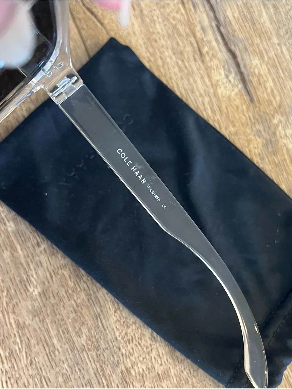 Cole Haan Clear Frame Sunglasses with Blue Mirror Lenses